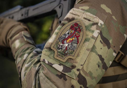 история шеврона снайпера